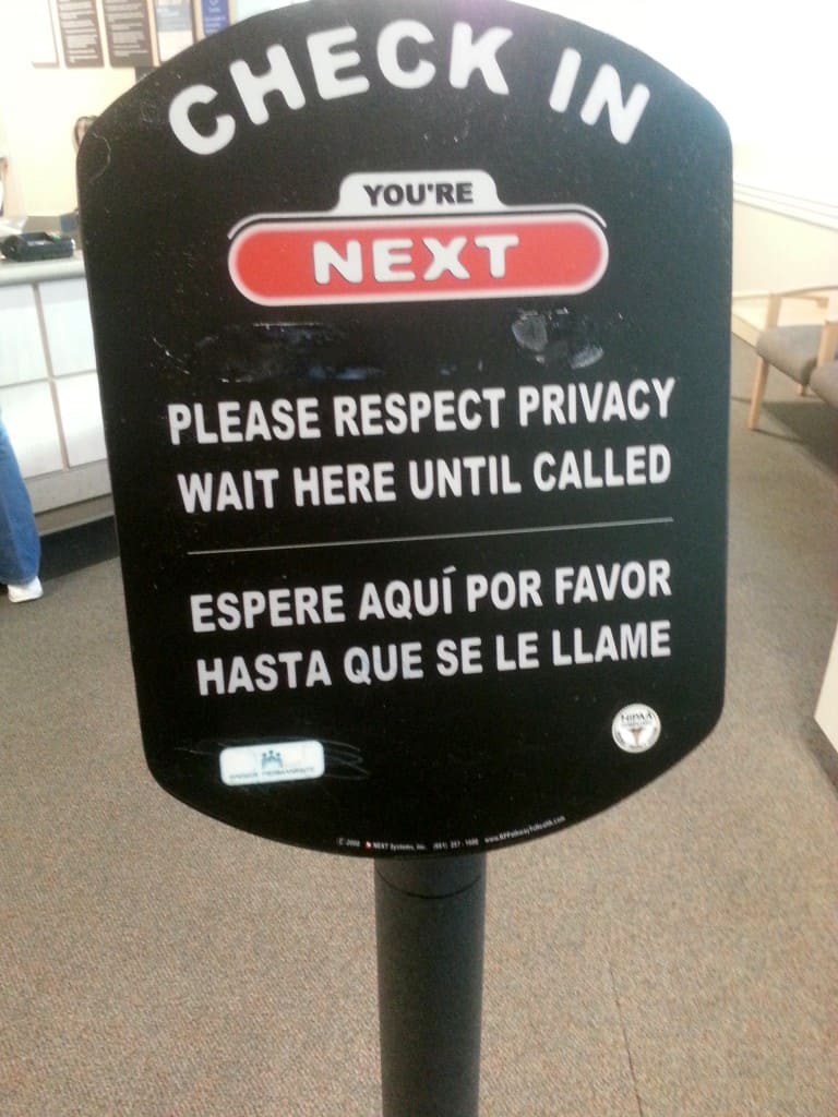 please wait sign