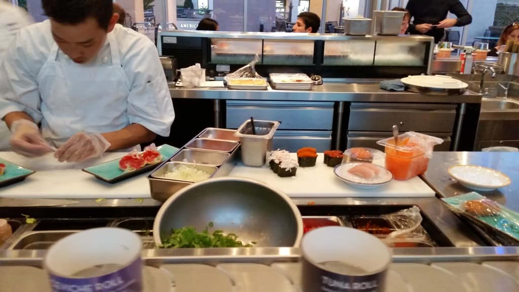 joe preparing food at blue c sushi
