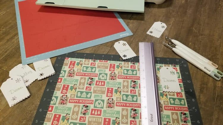 cutting out christmas gift tags