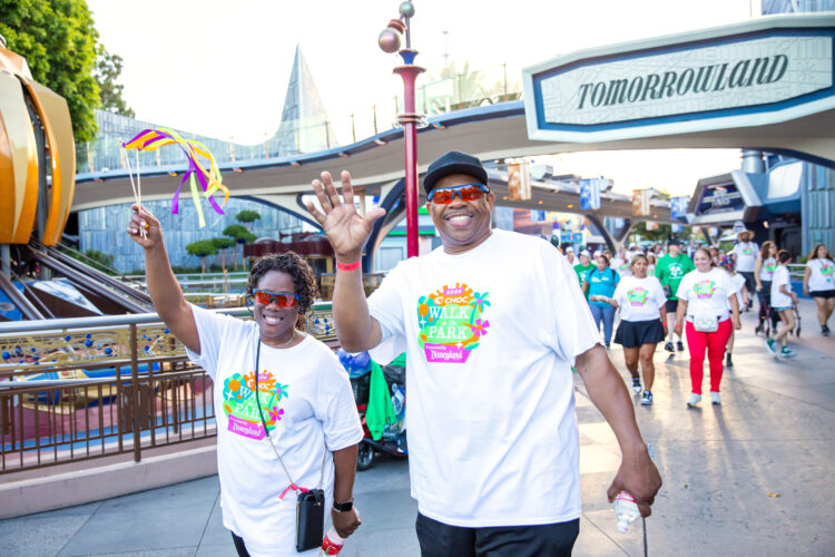 2025 CHOC Walk in the Park at Disneyland family walking through Tomorrowland