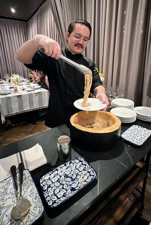tableside cheese wheel and pasta at Brio