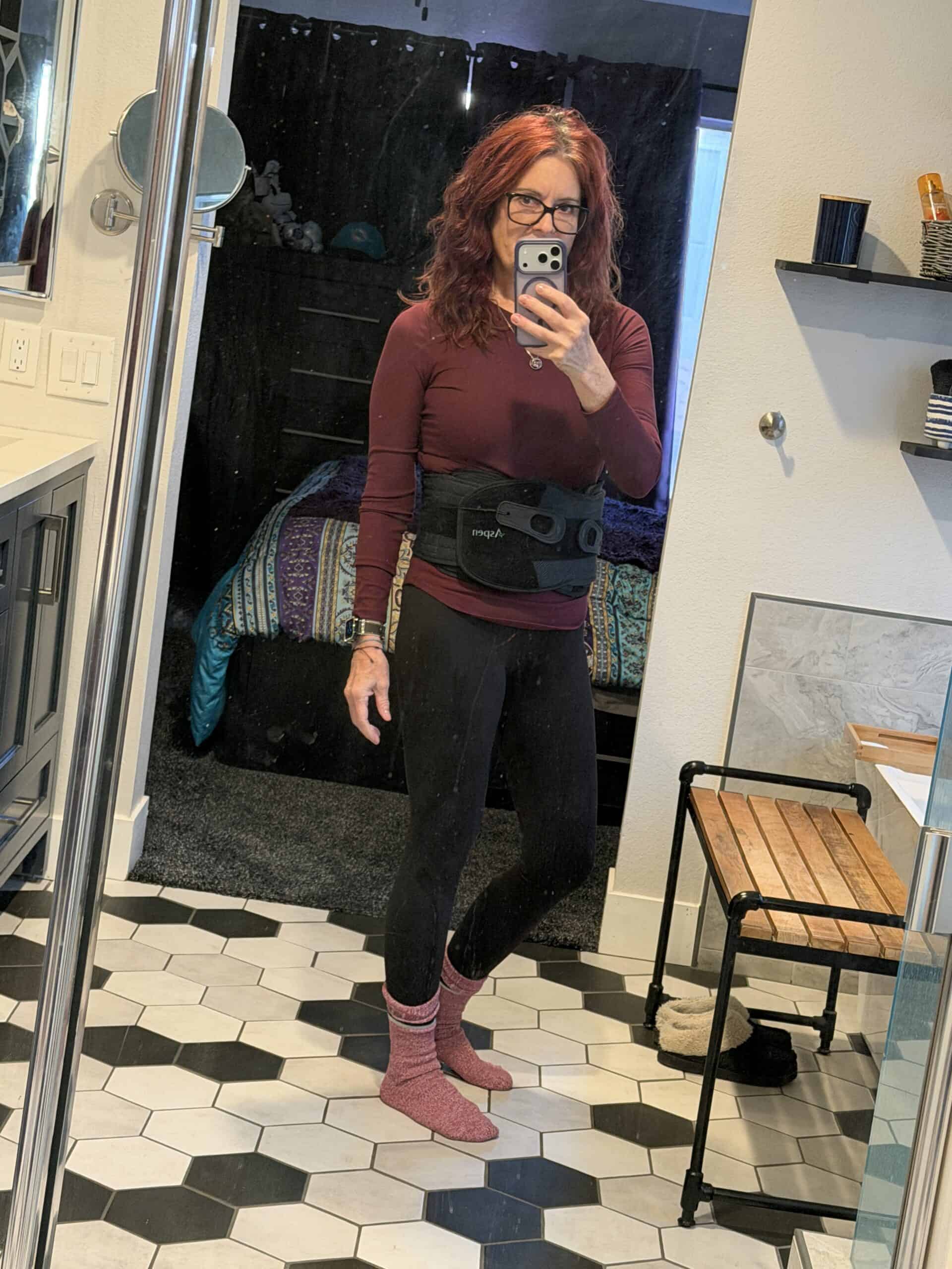Getting ready to heat out of the house, hair somewhat done and wearing my back brace over a snug shirt, so I could wear a looser cover over.