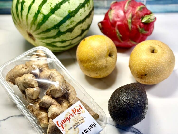 ingredients for the Citrus Watermelon and Asian Pear Salad on a kitchen counter