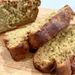 high-protein zucchini bread slices on a cutting board