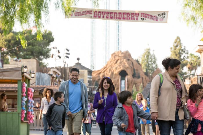 Families with Boysenberry Festival Banner with Log Ride